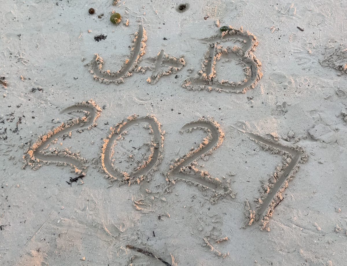 J+B 2027 written in the sand